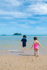 Children ran into the sea