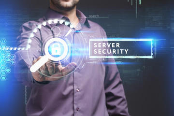 Business, Technology, Internet and network concept. Young businessman working on a virtual screen of the future and sees the inscription: Server security