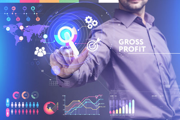 Business, Technology, Internet and network concept. Young businessman working on a virtual screen of the future and sees the inscription: Gross profit