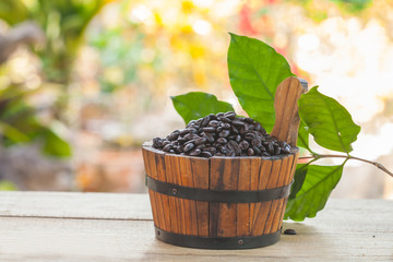 coffee bean in wood bucket