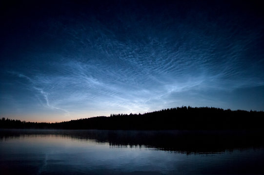 Noctilucent clouds at night