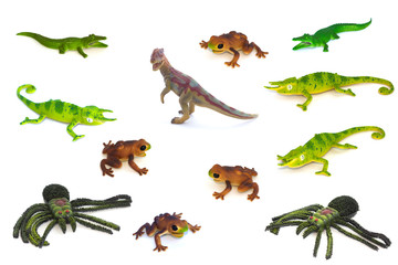 Collage of toy animals isolated on white background