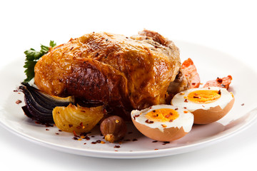 Roast chicken meat with potatoes and boiled egg