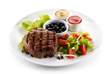 Roast steak on white plate