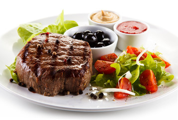 Roast steak on white plate