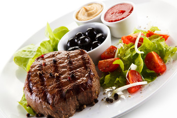 Roast steak on white plate