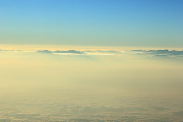Beautiful sunrise cloud sky mountain, view on airplane