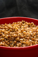 buckwheat cereal in a red bowl