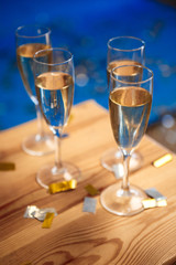 Close up photo of glasses with champagne.