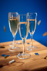 Close up photo of glasses with champagne.