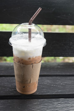 Cold coffee in plastic cup