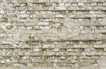 White, cracking brick wall texture
