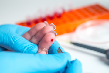 Taking blood for close-up analysis, a clinical blood test