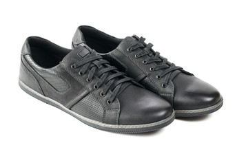 A pair of modern men's sport shoes in black.