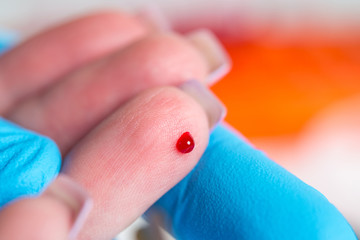 Taking blood for close-up analysis, a clinical blood test