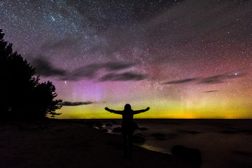 Naklejka na ściany i meble Intense northern lights (Aurora borealis) over Baltic sea