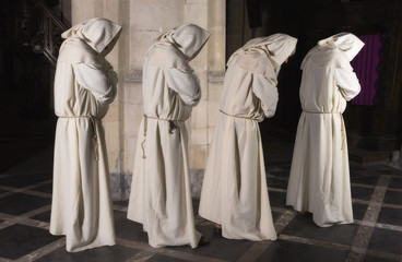 Fototapeta na wymiar Four monks in a row