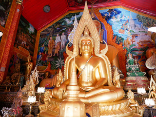 Buddha statues inside the Wat Phra That Doi Kham (Temple of the Golden Mountain) in Chiang Mai, Thailand