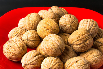 walnuts in red plate