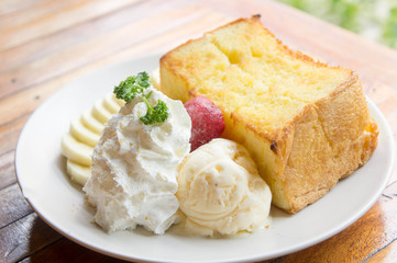 ice cream honey toast and whipped cream on the table