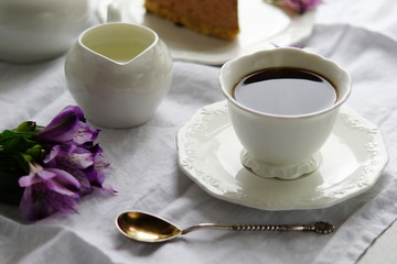 Coffee with milk and cake on a white background.top view.Holiday. Mother's day.