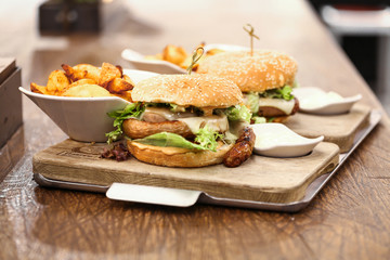 Two delicious wurst burgers served with french fries