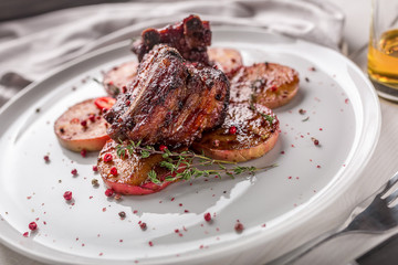 Hot Meat Dishes. Pork ribs grilled with peppers and apples