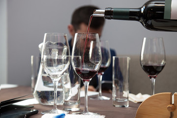 tasting red wine
