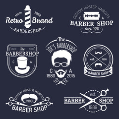Vector set of vintage hipster barbershop logos. Hairdresser badges or emblems collection.