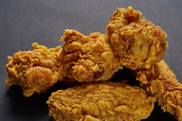 crispy kentucky fried chicken in beauty black background