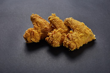 crispy kentucky fried chicken in beauty black background