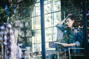 Fototapeta premium Asia teenage hipster in happy with friend in cafe.