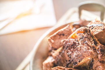 dessert - chocolat powder and bread on wood table in cafe