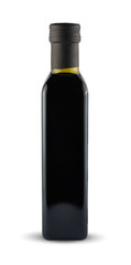 Black bottle with balsamic sauce isolated on white background with clipping path