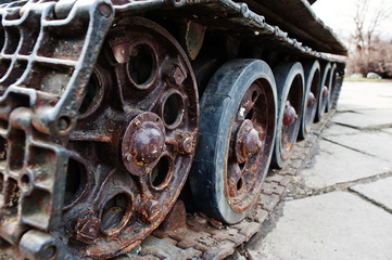 Detail shot with old vintage tank tracks and wheels.