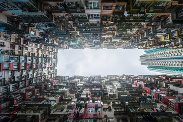 Fototapeta na wymiar Crowded apartment view from bottom in Hong Kong