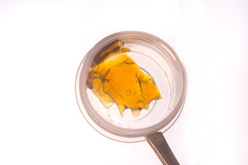 Piece of cannabis oil concentrate aka shatter used by medical marijuana patients