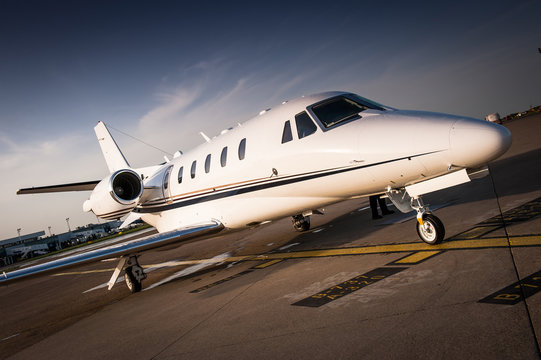 Luxury Business Jet Parked At The Airport Tarmac