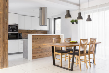 White kitchen with table