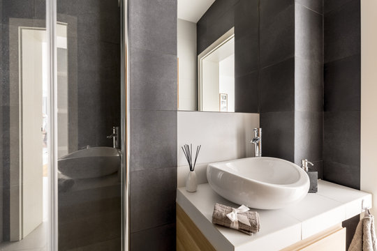 Grey bathroom with mirror