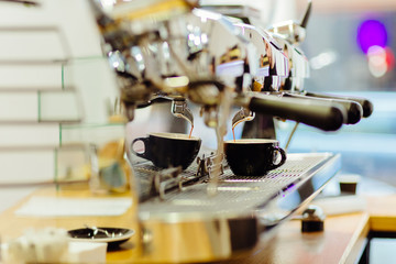 Close-up of prepares espresso in coffee shop.