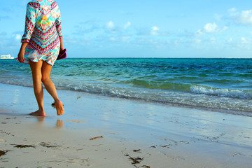 Woman walking on the beach