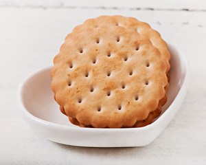 Chocolate chip cookies on the old wooden background, food.