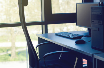 Comfortable Office Workplace With Desktop Computer Next To A Window