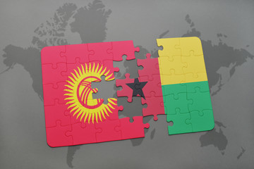puzzle with the national flag of kyrgyzstan and guinea bissau on a world map