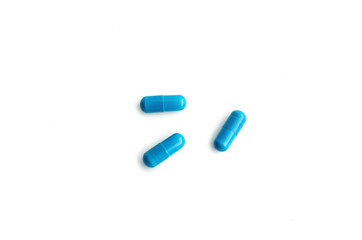 group medical tablet capsule blue, isolated on white background