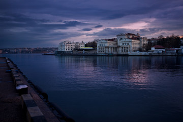 Fototapeta premium Sunrise in violet in the bay of Sevastopol, Crimea