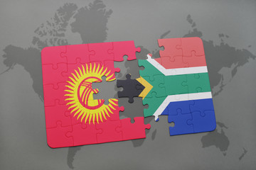 puzzle with the national flag of kyrgyzstan and south africa on a world map