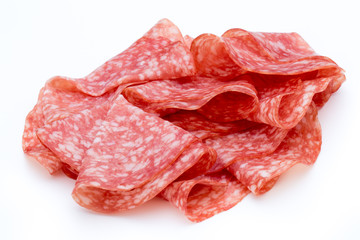 Salami smoked sausage slices isolated on white background cutout.