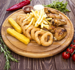 Cheese sticks and onion rings. Set of snacks for a beer table